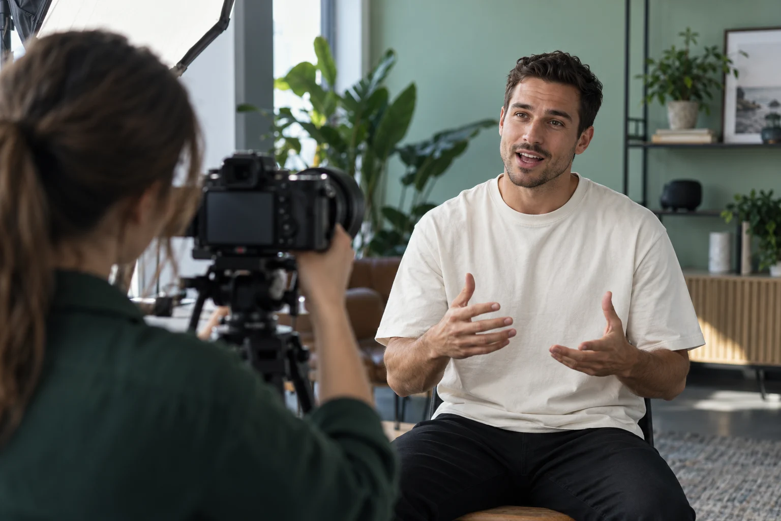 Illustrative content shoot with a speaker in front of a camera