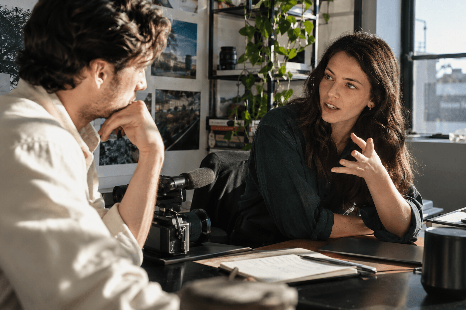 Illustrative editorial scene of a business conversation being recorded